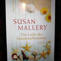 Buchcover auf Kindle Susan Mallery Die Liebe der Sonnenschwestern Seesterne und Muscheln auf dem Cover